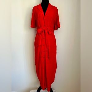 Maeve for Anthropologie Shirt dress with curved hem, sleeves and a belt.